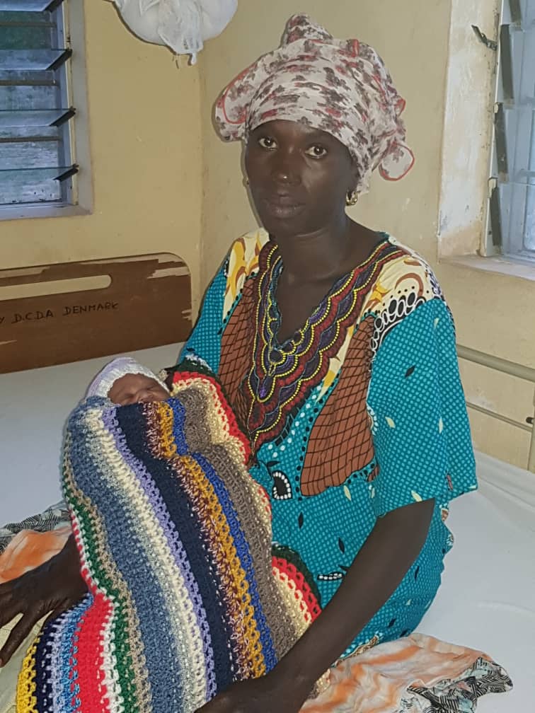 Mother and a new born baby, born at home and report to the health centre - Copy